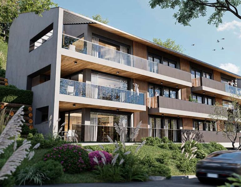 Residenziale edificio moderno a tre piani con balconi e vetrate, giardino curato e arbusti, cielo sereno sullo sfondo.