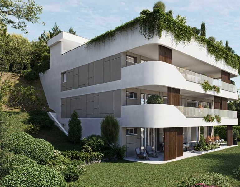 Complesso residenziale moderno a tre piani, con balconi curvi, facciata bianca e verdeggiante, immerso in un verde giardino.