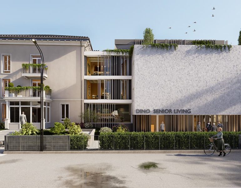 Edificio moderno di servizi per anziani con facciata bianca e legno, balconi e giardino frontale; cartello Dinosaur Senior Living visibile.