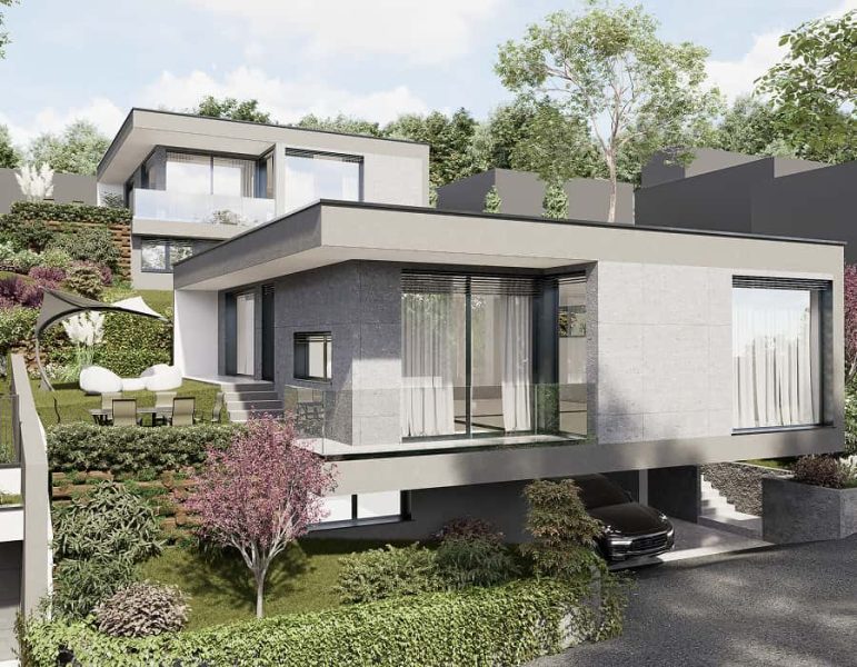Casa moderna su più livelli con grandi vetrate, giardino e parcheggio; tonalità neutre, serramenti scuri e tuttora diverse piante e alberi circostanti.
